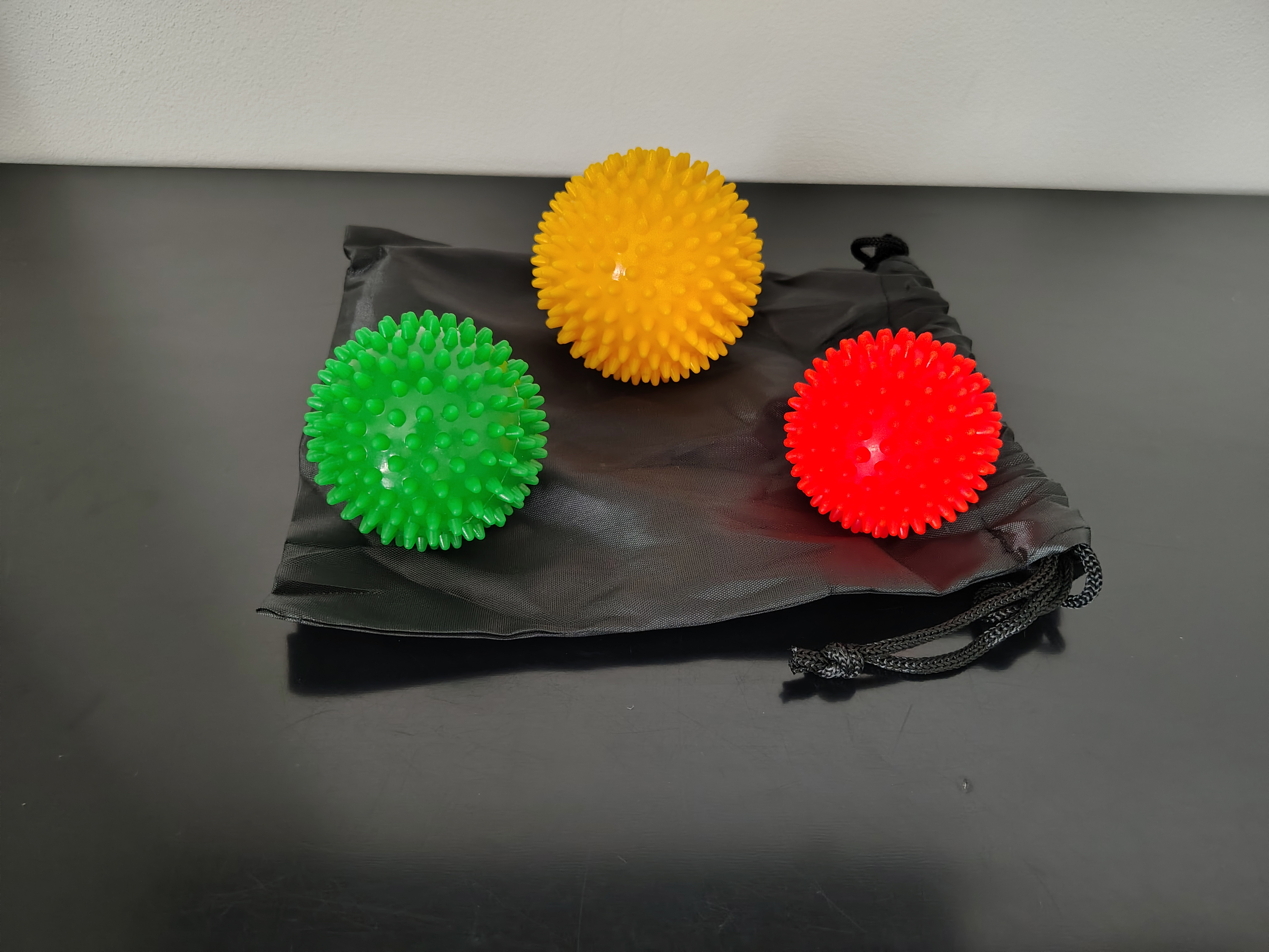 Set 3 palline massaggianti + borsetta porta oggetti